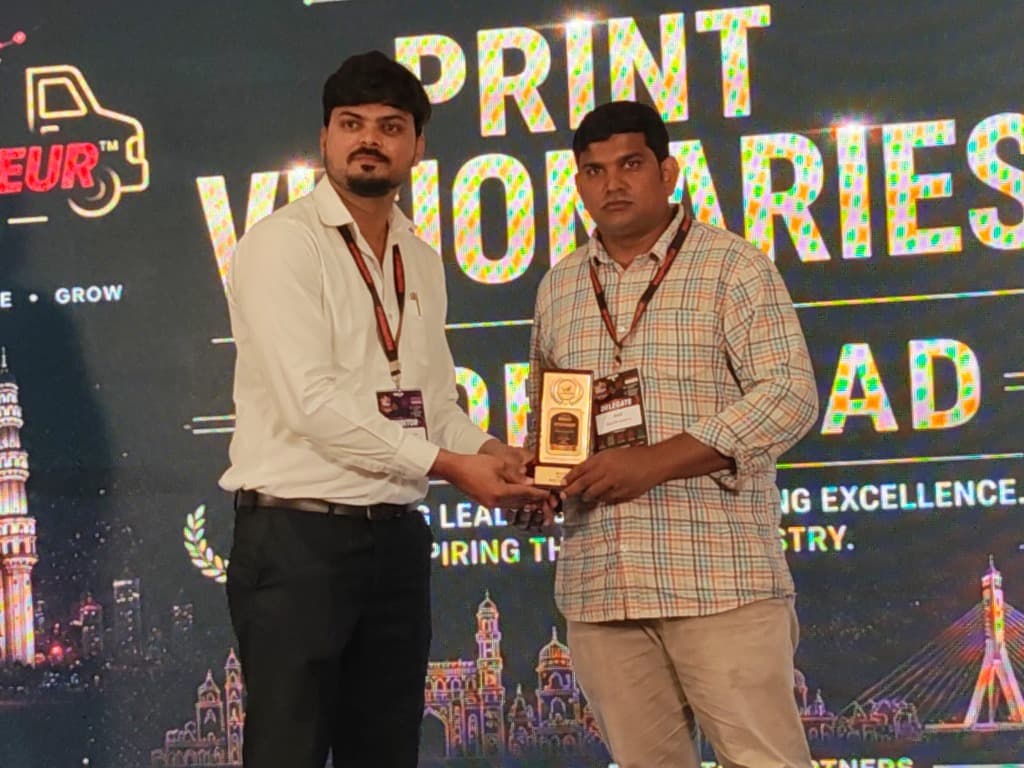 NVS Printers founder receiving Print Visionaries award — Hyderabad